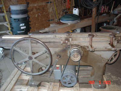 New mechanicals of jointer including original cutterhead pulley with 2 grooves.