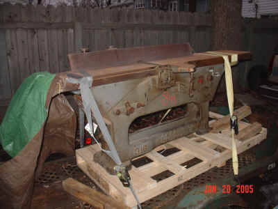 Jointer on trailer in driveway.